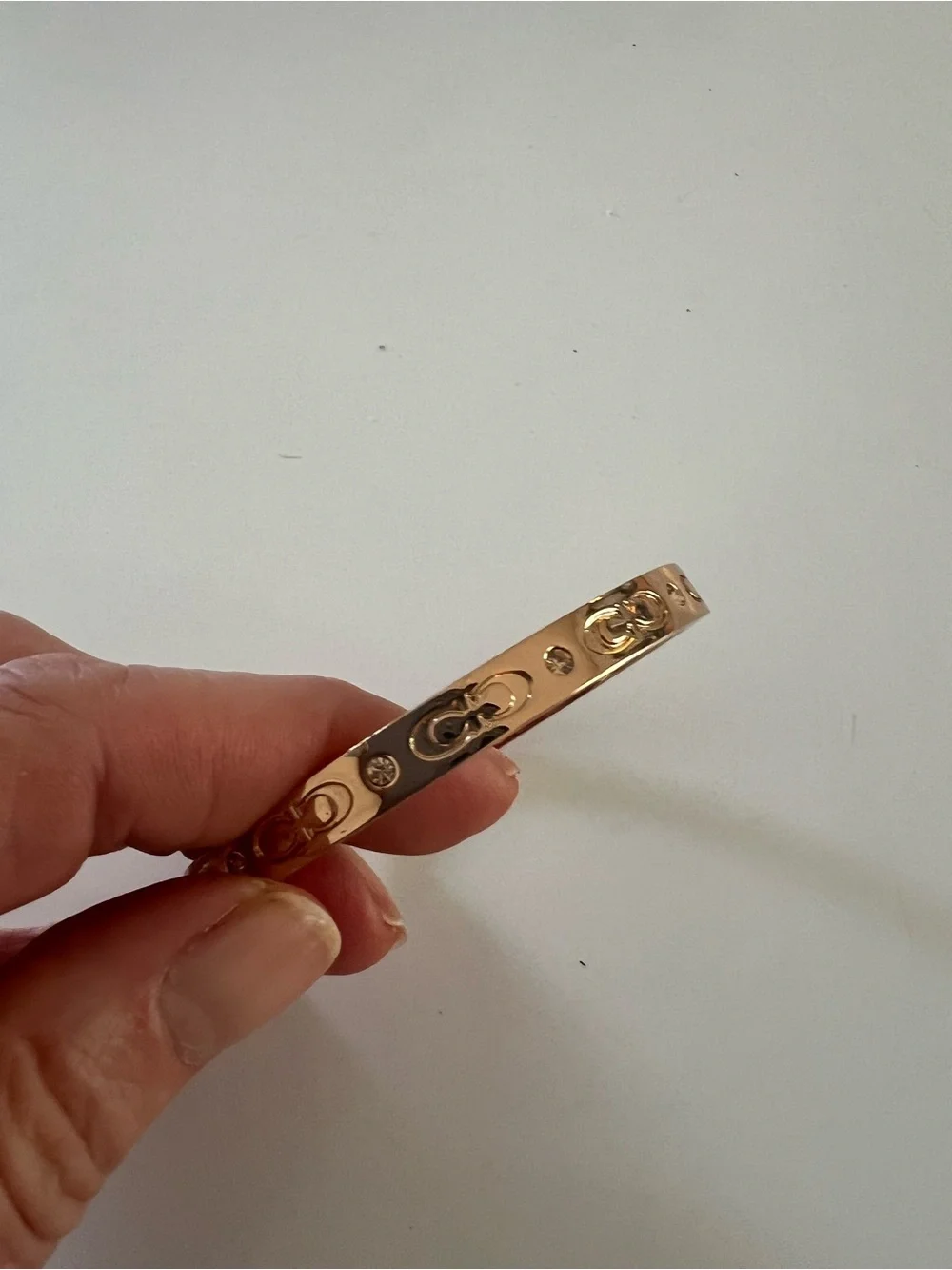 Coach Signature Hinged Bangle Bracelet in Rose Gold CX686